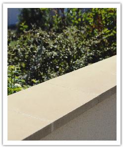 Dry-cast single weathered copings - bathstone - in reconstructed stone 